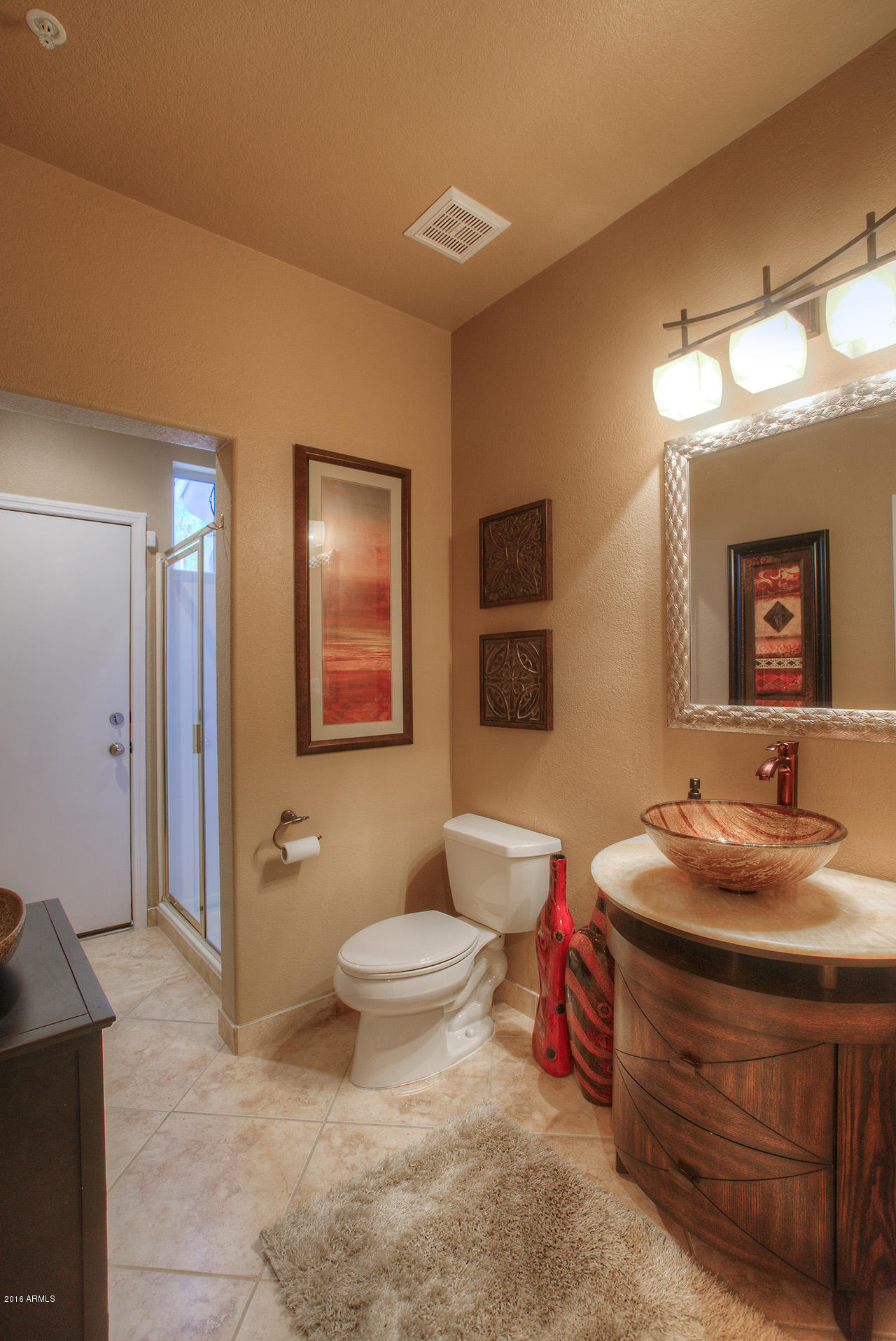 7532 East Alameda Road Scottsdale, AZ 85255 - Photo 10 of 27 a bathroom with a sink and a mirror