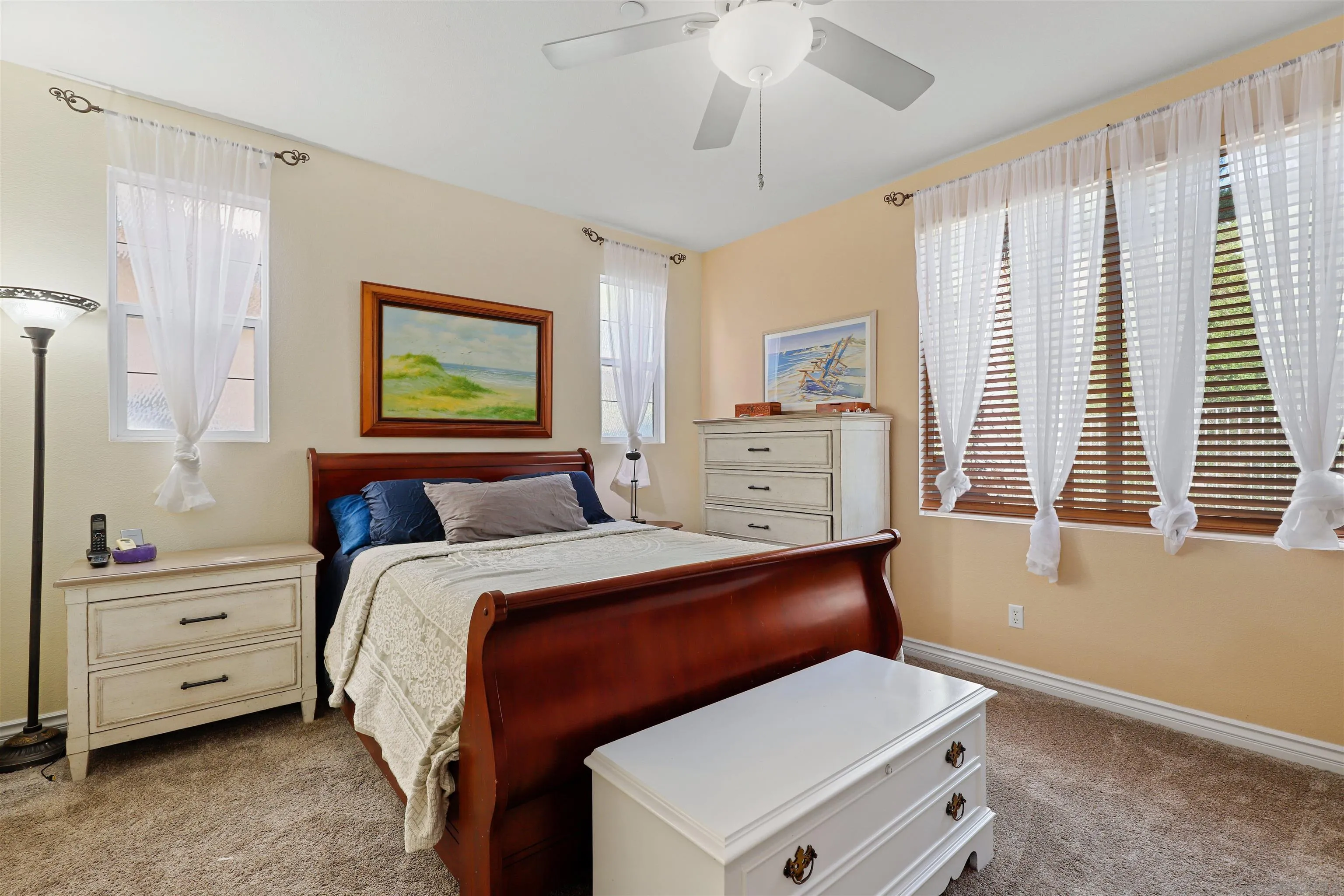 554 Poets Square Fallbrook, CA 92028 - Photo 11 of 28 a bedroom with a bed and a window