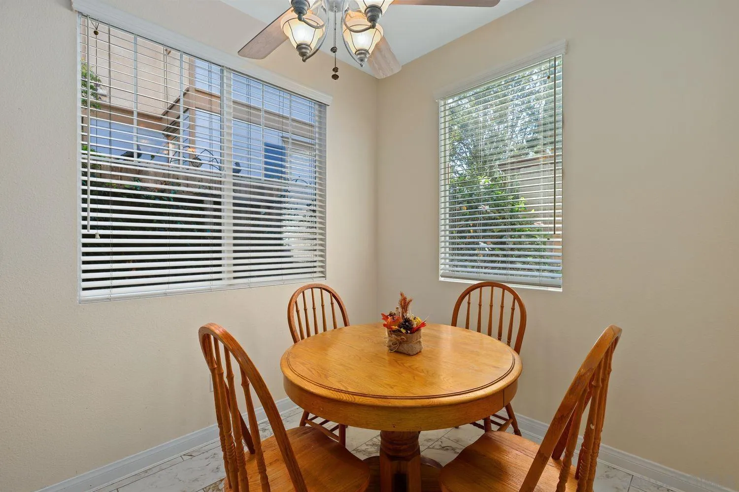554 Poets Square Fallbrook, CA 92028 - Photo 8 of 28 a view of a dining room with furniture and window
