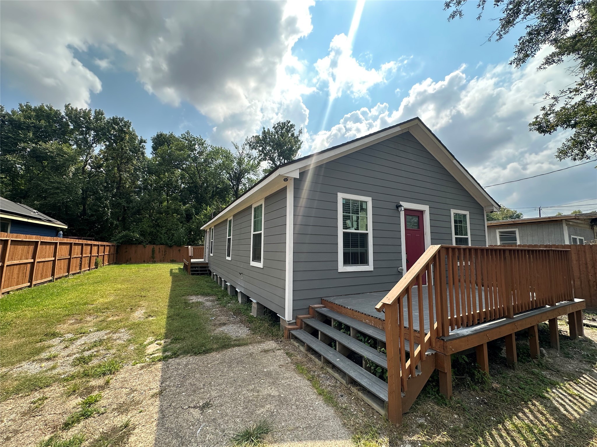 5910 East Houston Road Houston, TX 77028 - Photo 1 of 33 a view of a house with backyard and sitting area