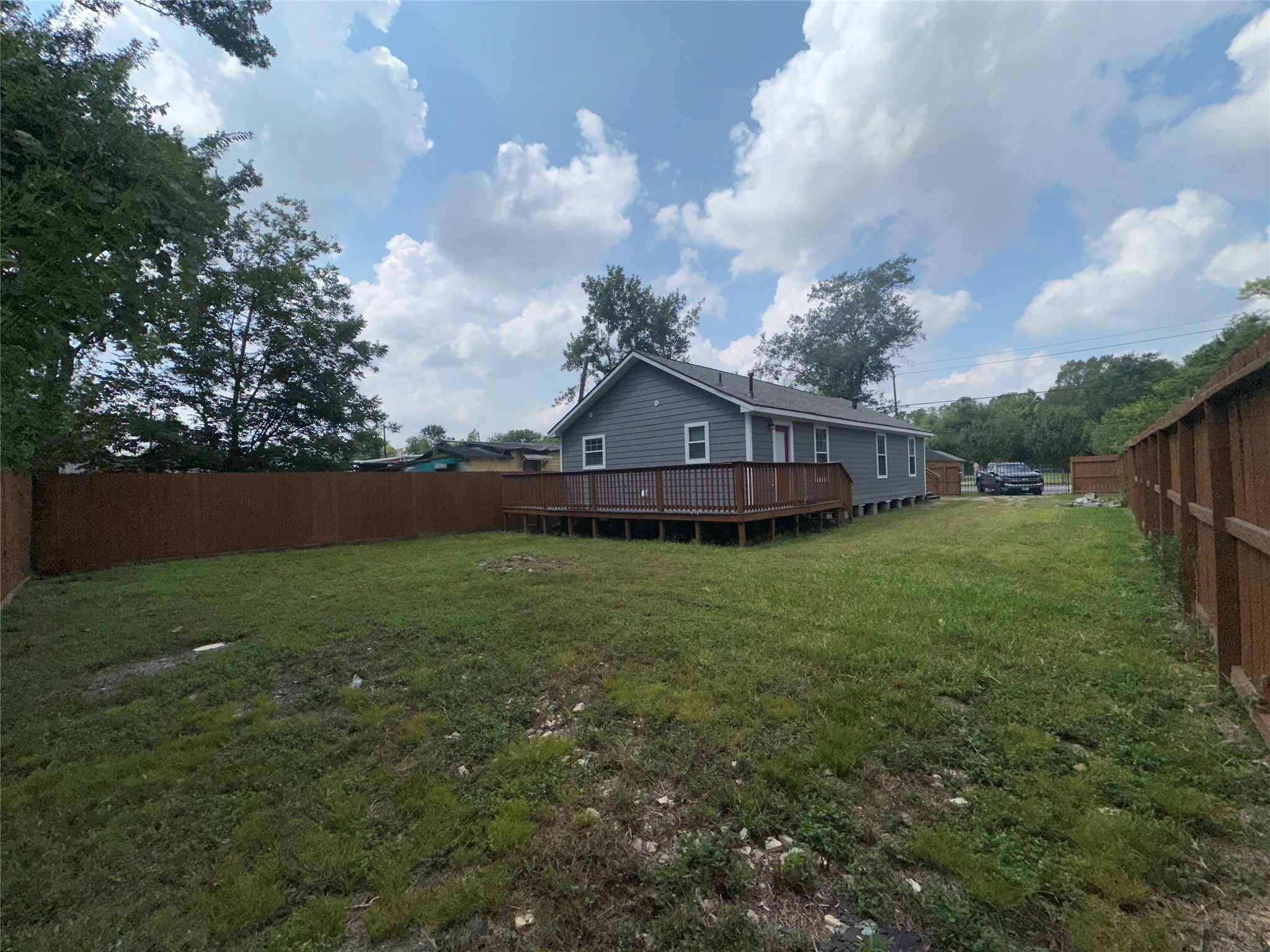 5910 East Houston Road Houston, TX 77028 - Photo 25 of 33 a view of house with backyard and garden