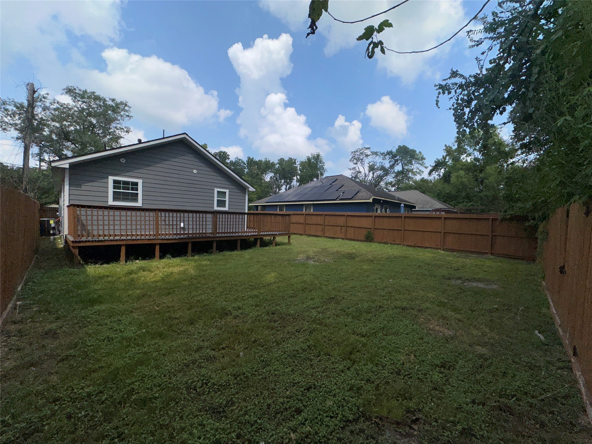 5910 East Houston Road Houston, TX 77028 - Photo 27 of 33 a view of a house with a back yard
