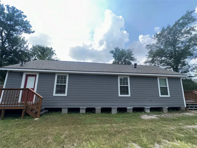 a view of a backyard with a garden