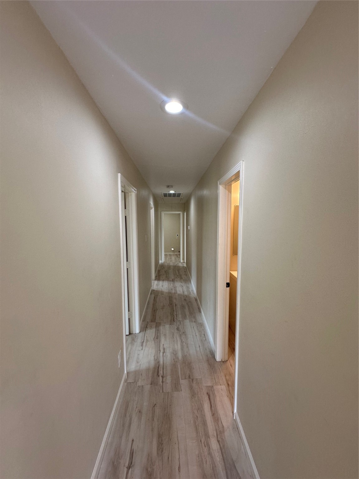 5910 East Houston Road Houston, TX 77028 - Photo 8 of 33 a view of hallway with wooden floor