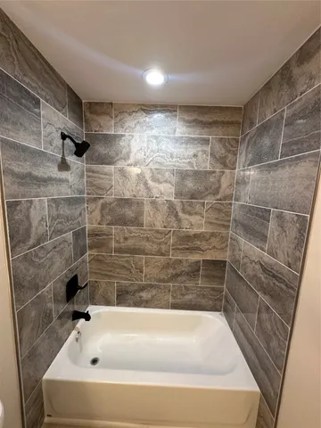 a bathroom with a bathtub