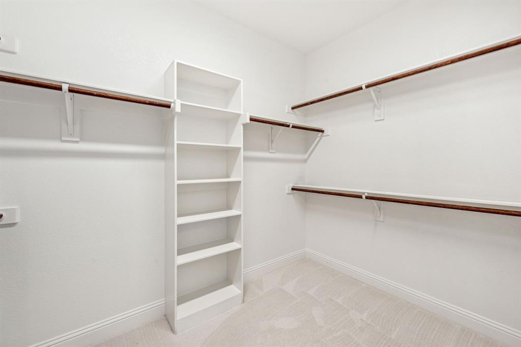 122 John Street Aledo, TX 76008 - Photo 16 of 33 a view of an empty walk in closet