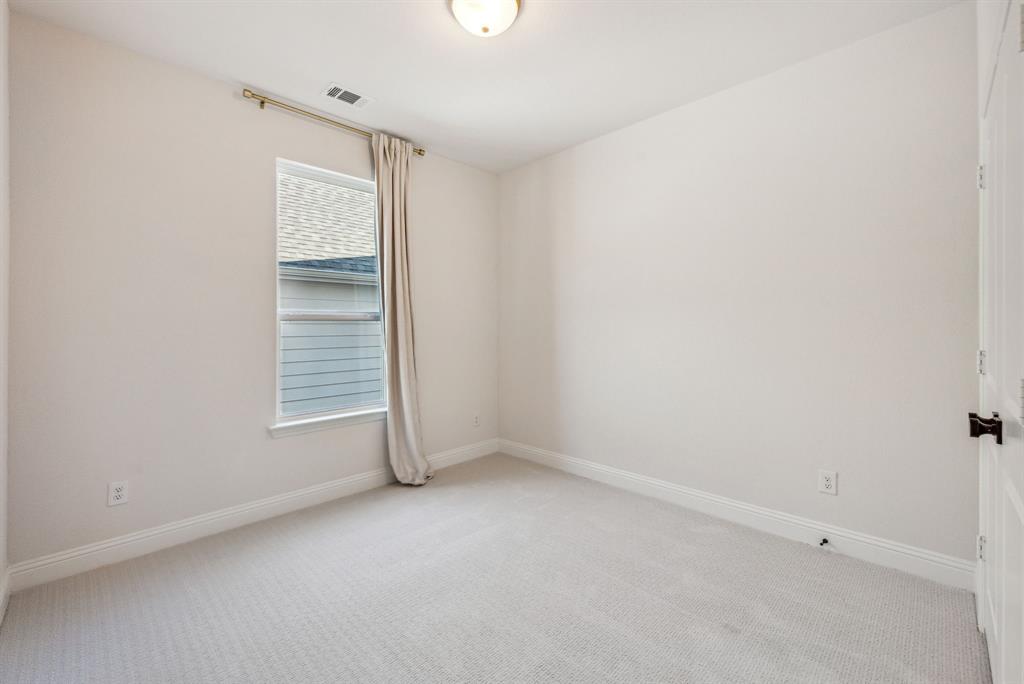 122 John Street Aledo, TX 76008 - Photo 21 of 33 an empty room with windows