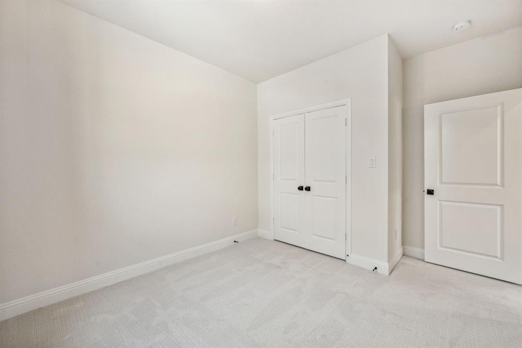 122 John Street Aledo, TX 76008 - Photo 26 of 33 an empty room with white door