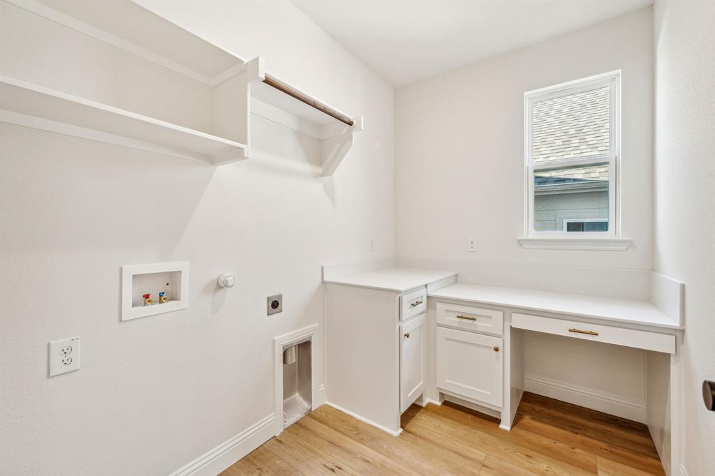122 John Street Aledo, TX 76008 - Photo 28 of 33 a view of cabinets and wooden floor