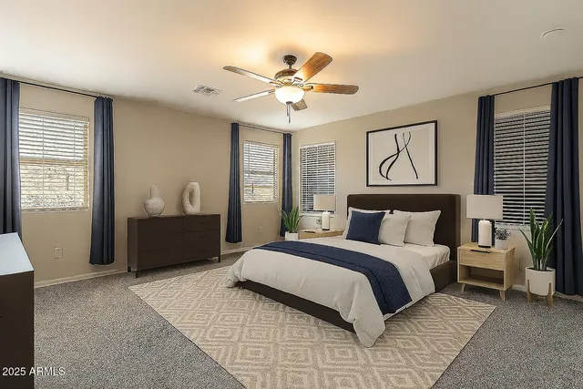 a kitchen with stainless steel appliances granite countertop a sink a stove and cabinets