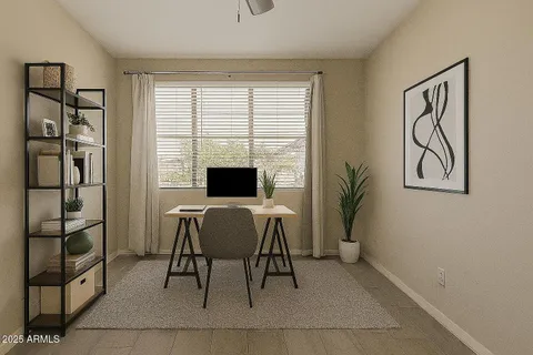 a view of a livingroom with furniture and window