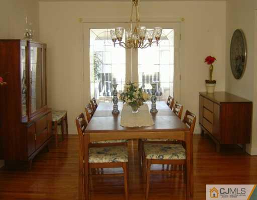 14 Lexington Road Somerset, NJ 08873 - Photo 3 of 8 a view of a dining room with furniture and window