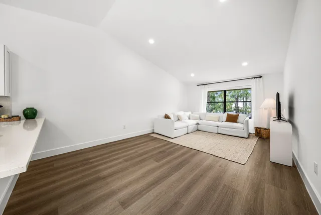 a bed room with a bed and a window