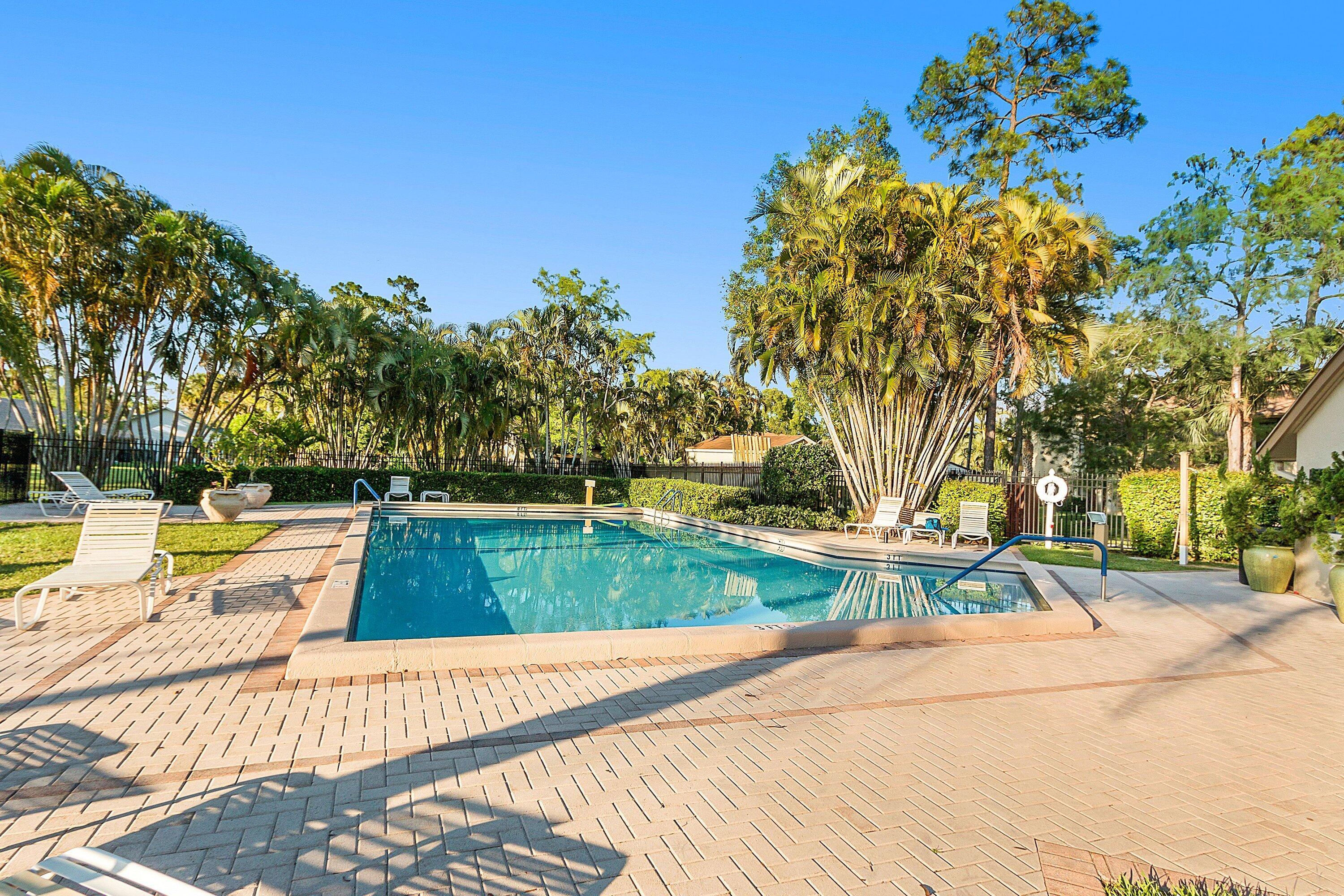 13105 Belhaven Court, Unit 15 Wellington, FL 33414 - Photo 9 of 31 Community pool