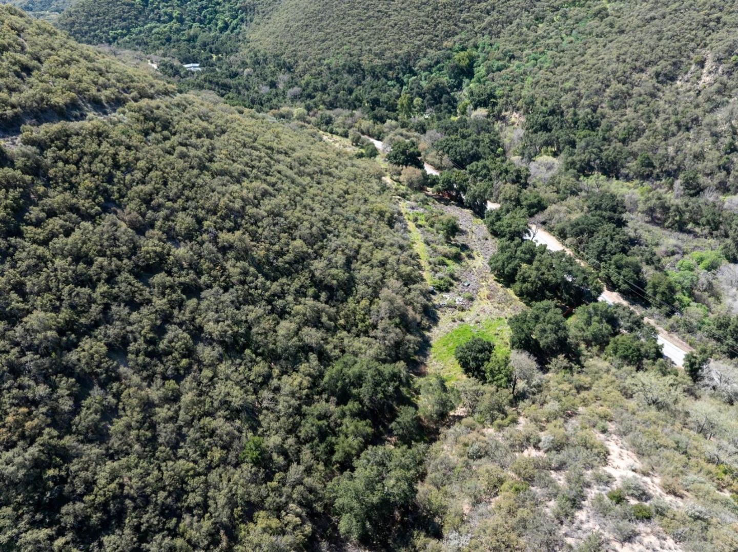 44175 East Carmel Valley Road Greenfield, CA 93927 - Photo 22 of 24 a view of a large yard with lots of green space