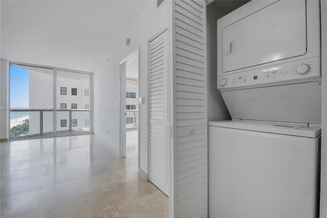a view of wooden floor and windows in a room