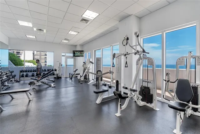 a view of a balcony with furniture