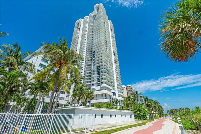 a view of swimming pool from a balcony