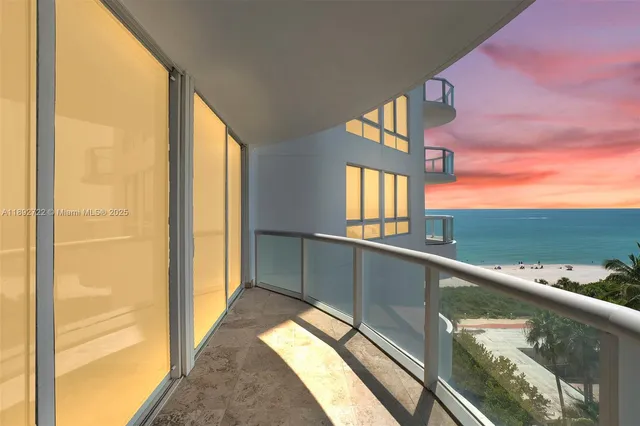 a bathroom with a sink toilet vanity and shower
