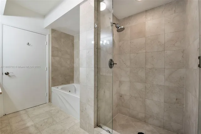 a view of staircase with railing and a rug