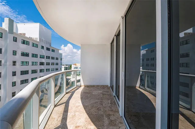 a picture of a building with a potted plant