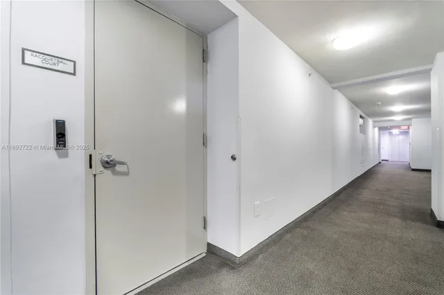 a room with lots of furniture and windows