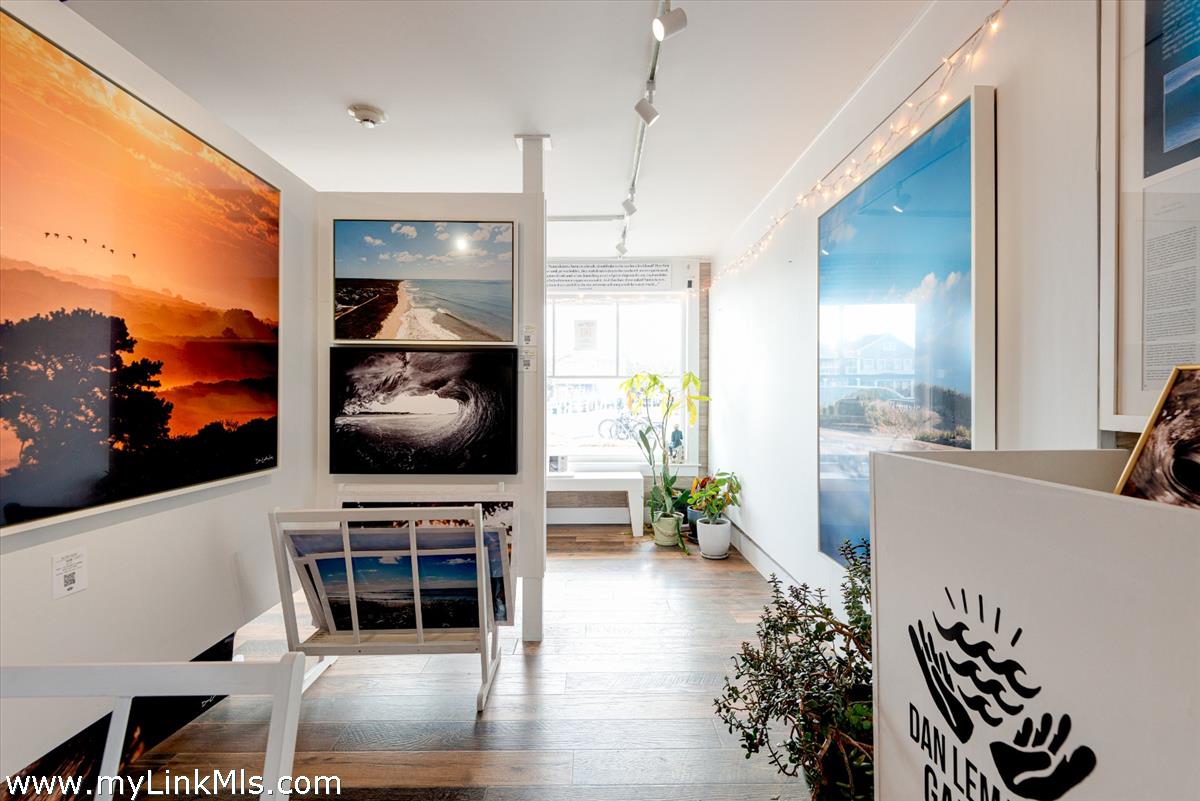 26 Easy Street, Unit 1 Nantucket, MA 02554 - Photo 9 of 13 a living room with furniture and a flat screen tv
