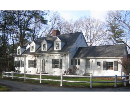 22 Normandie Road Dover, MA 02030 - Photo 1 of 11 a front view of house with yard porch and outdoor seating