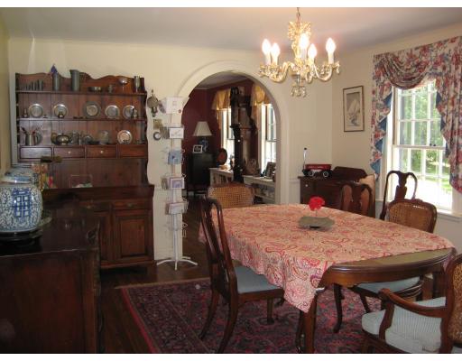 22 Normandie Road Dover, MA 02030 - Photo 6 of 11 a view of a dining room with furniture and chandelier