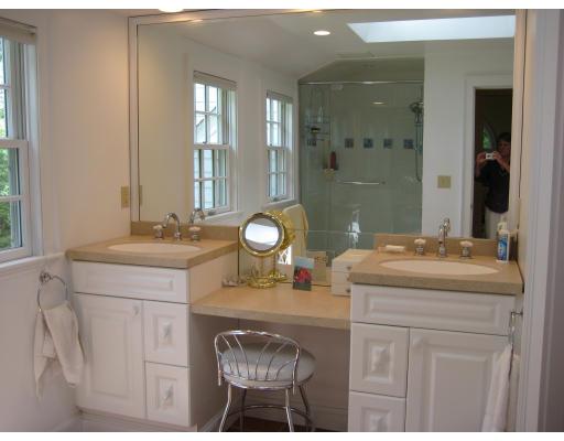 22 Normandie Road Dover, MA 02030 - Photo 8 of 11 a bathroom with a sink and a mirror