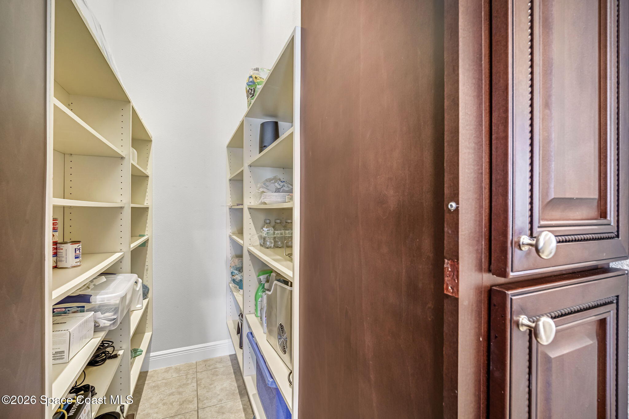 4567 Preservation Circle Melbourne, FL 32934 - Photo 3 of 75 Walk-in Pantry