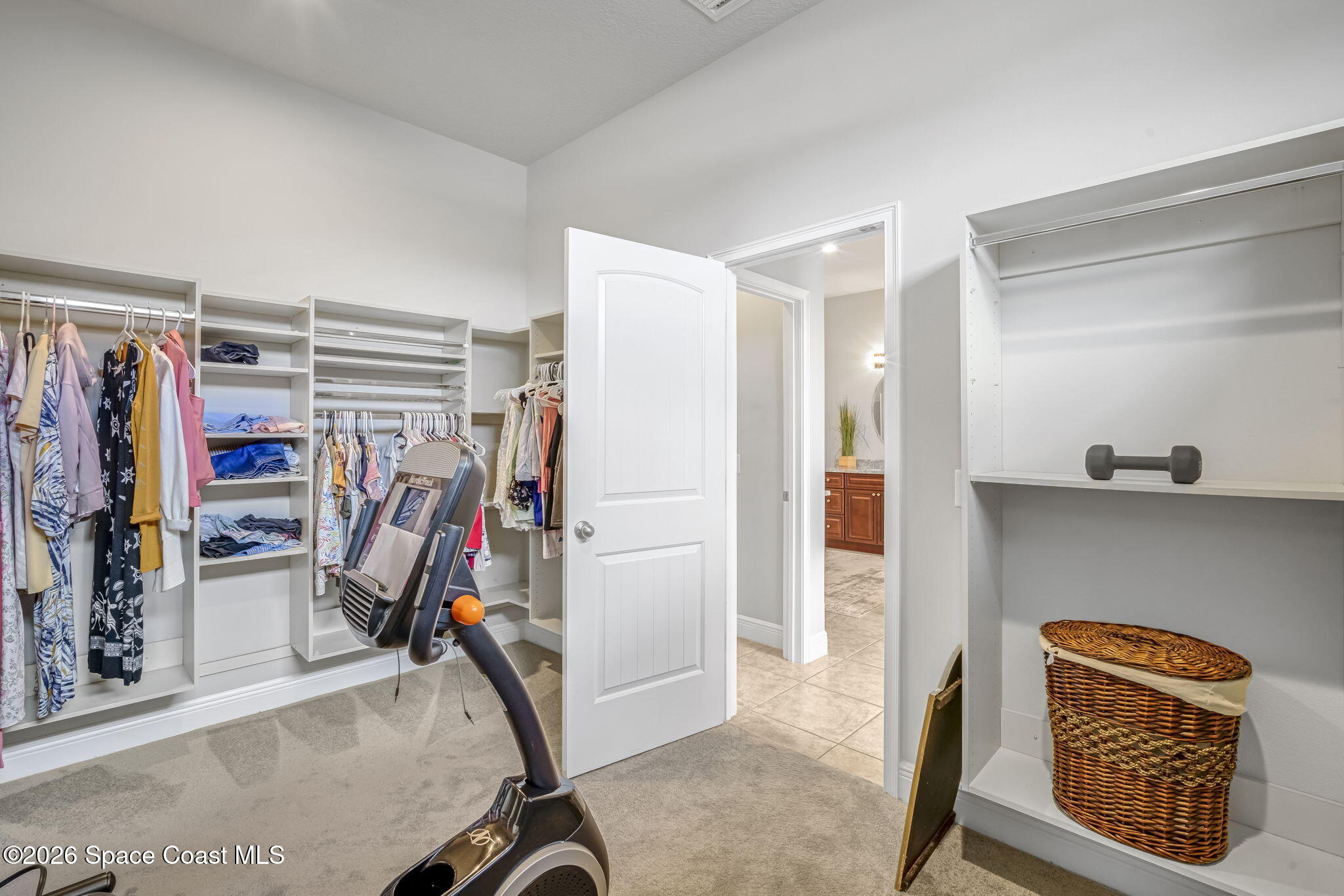 4567 Preservation Circle Melbourne, FL 32934 - Photo 33 of 75 Walk-in Closet with Built in Shelves