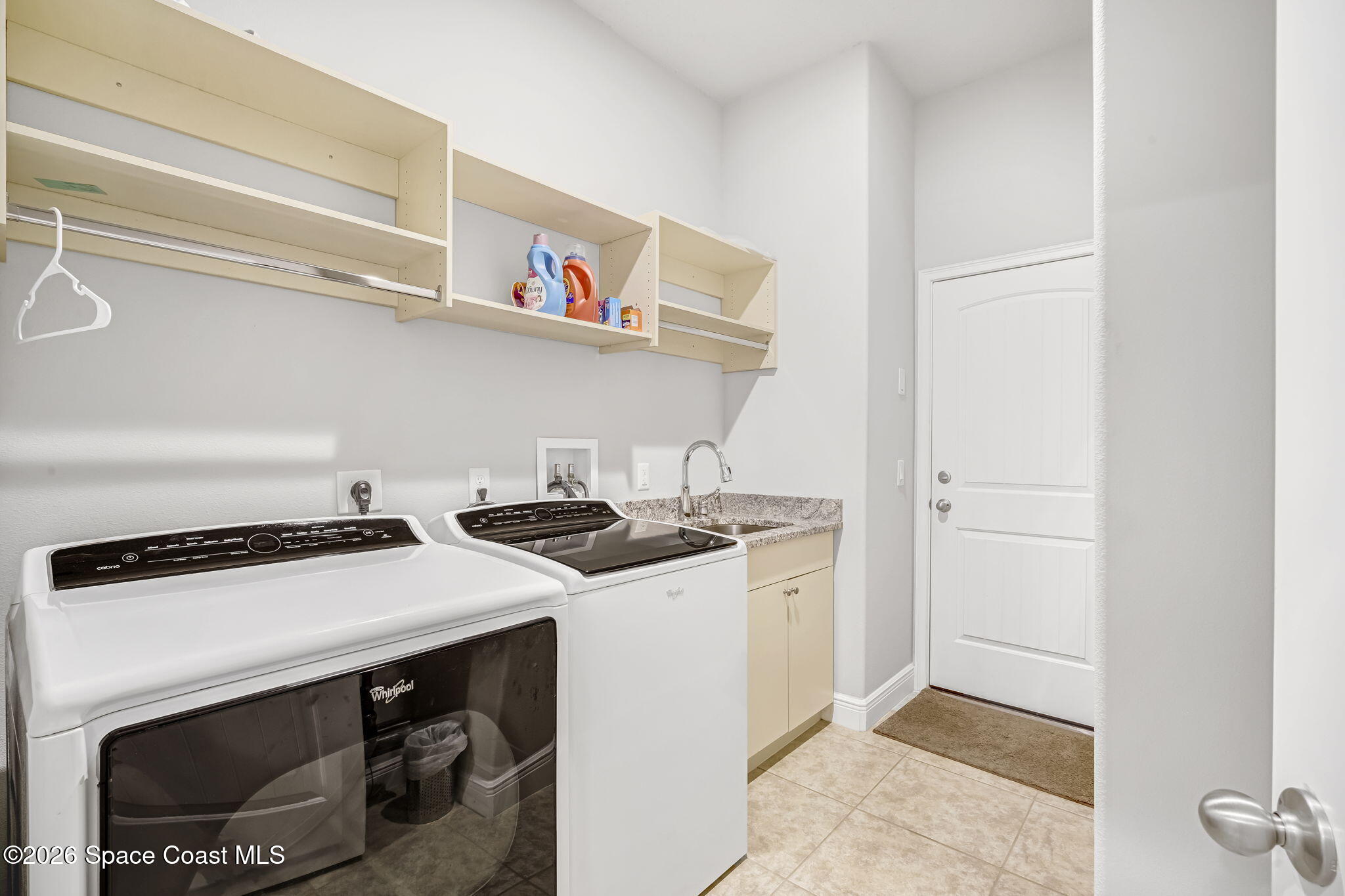 4567 Preservation Circle Melbourne, FL 32934 - Photo 52 of 75 Laundry Room with a utility sink