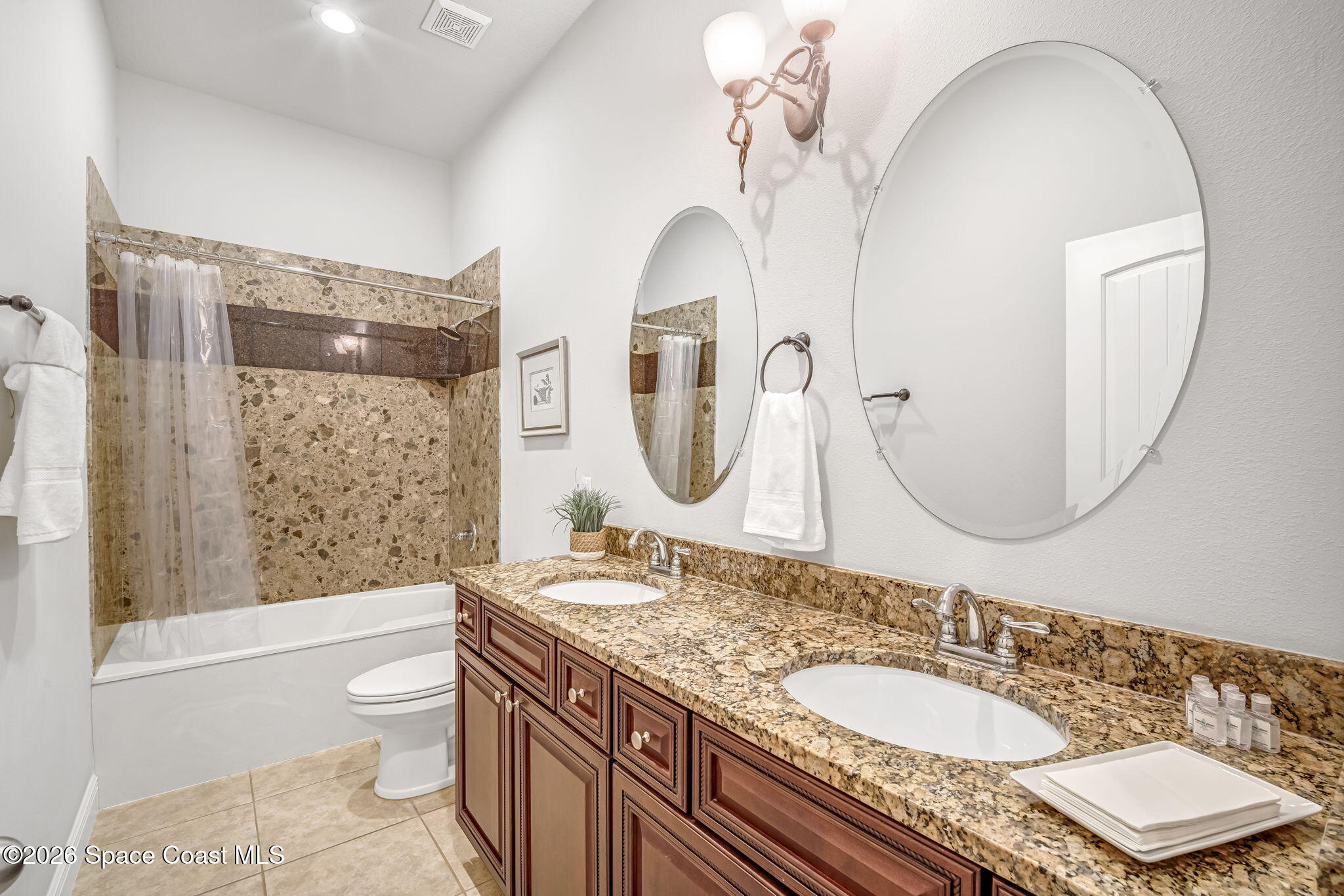 4567 Preservation Circle Melbourne, FL 32934 - Photo 61 of 75 Guest Bathroom with double vanity