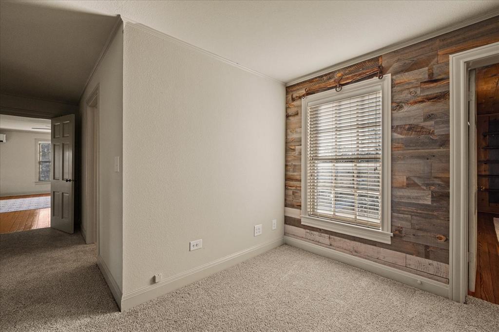601 North Main Street Leonard, TX 75452 - Photo 23 of 34 Unfurnished room with carpet and a textured wall