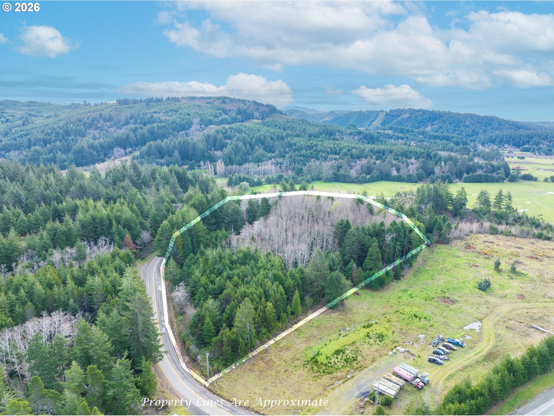 South Crystal Creek Road, Unit 804 Sixes, OR 97476 - Photo 1 of 10 an aerial view of residential houses with outdoor space and trees