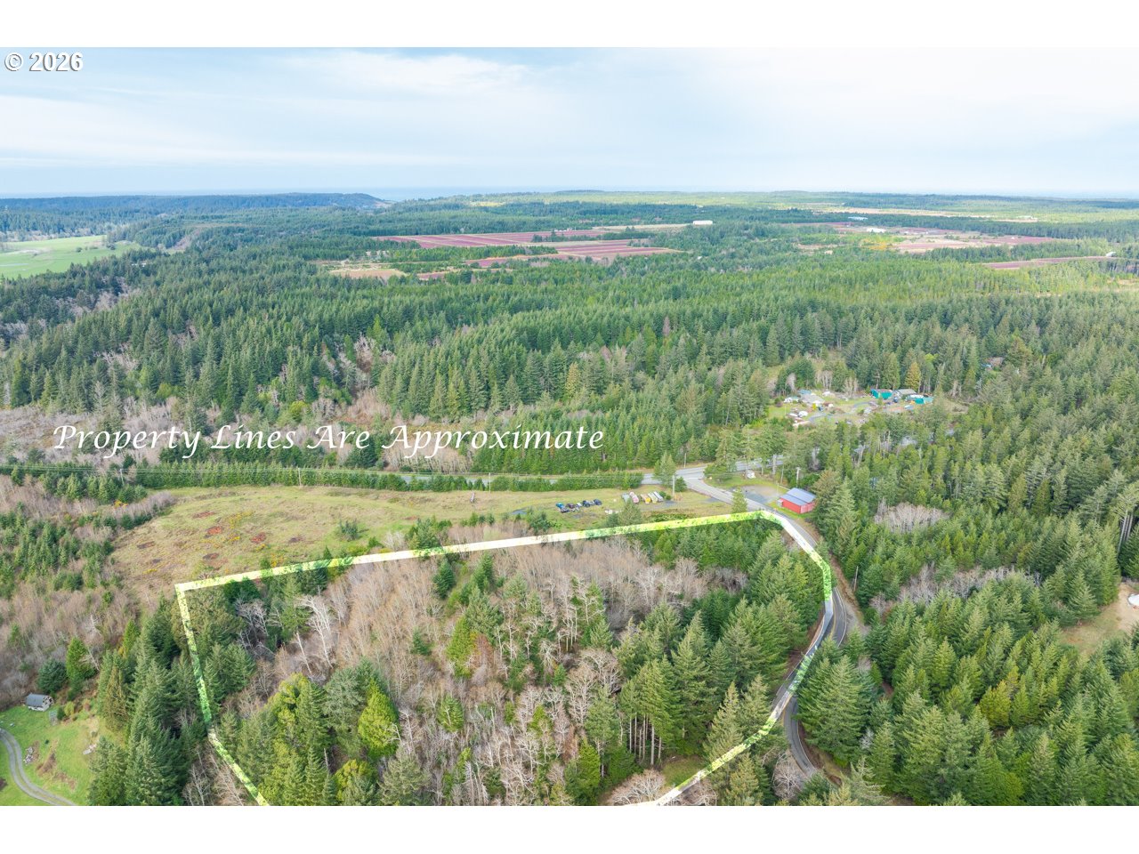 South Crystal Creek Road, Unit 804 Sixes, OR 97476 - Photo 5 of 10 a view of a city with lush green forest