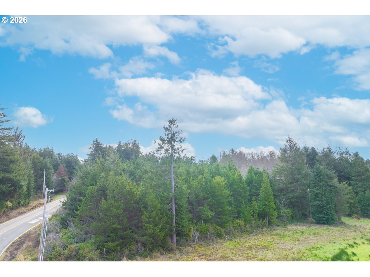 South Crystal Creek Road, Unit 804 Sixes, OR 97476 - Photo 6 of 10 a view of a city and a lots of trees