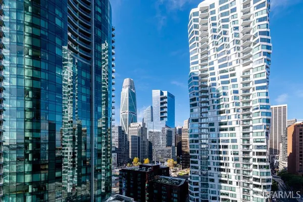 a view of a city with tall buildings