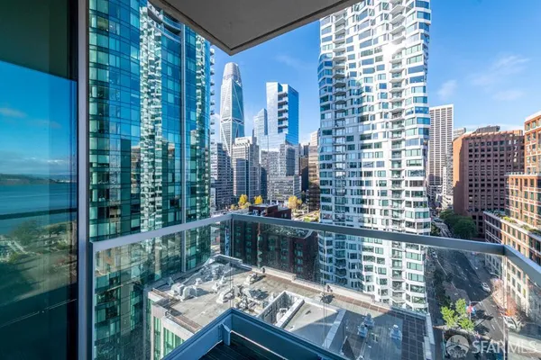 a view of swimming pool from a balcony