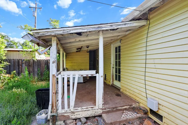 a view of a house with a porch