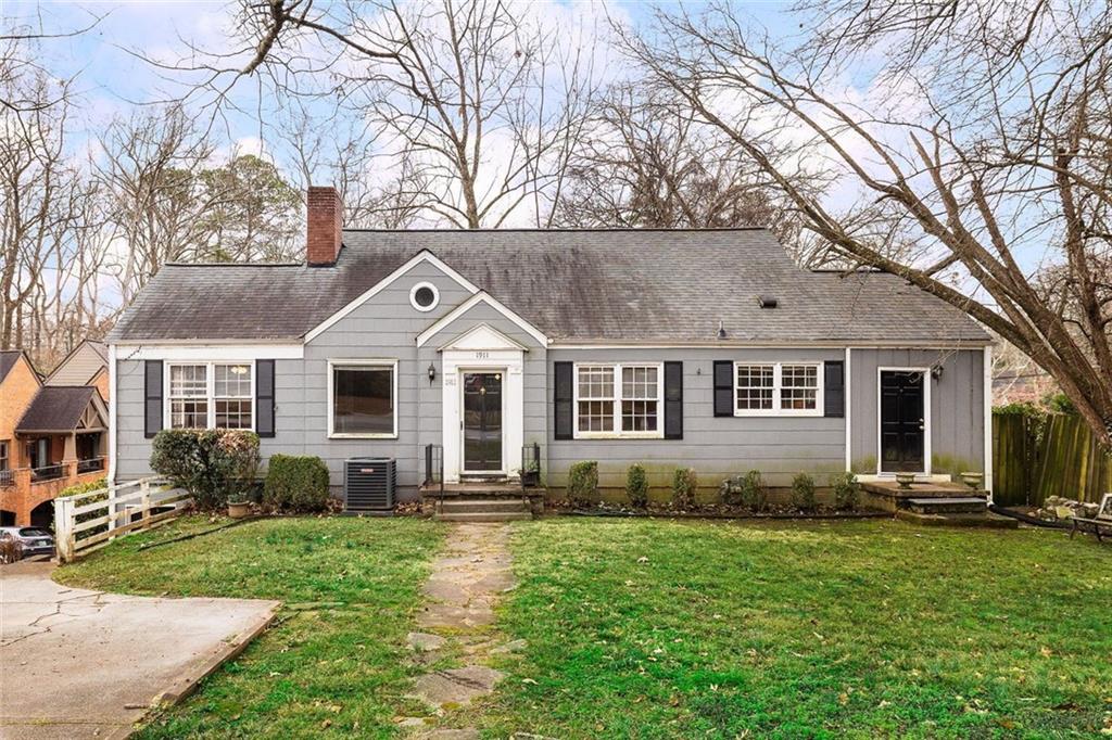 1911 North Decatur Road, Unit 2 Atlanta, GA 30307 - Photo 2 of 16 a front view of a house with a yard