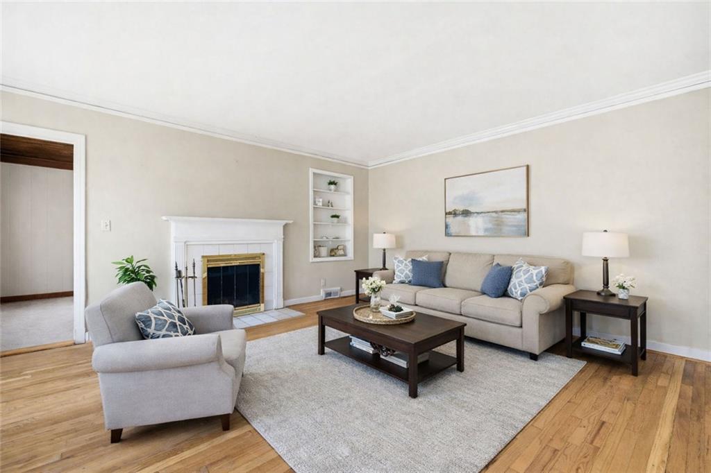 1911 North Decatur Road, Unit 2 Atlanta, GA 30307 - Photo 5 of 16 a living room with furniture and a fireplace