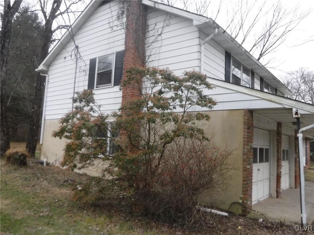 755 Silver Spring Boulevard Kunkletown, PA 18058 - Photo 4 of 20 a view of a house with a yard
