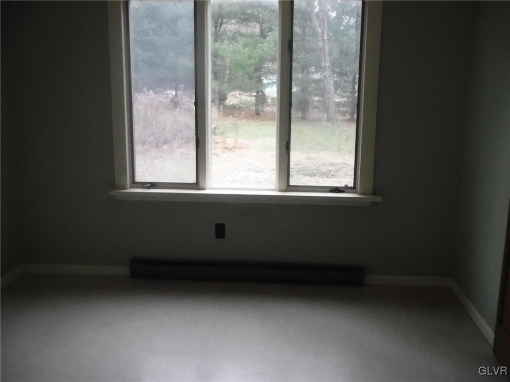 755 Silver Spring Boulevard Kunkletown, PA 18058 - Photo 8 of 20 an empty room with a window