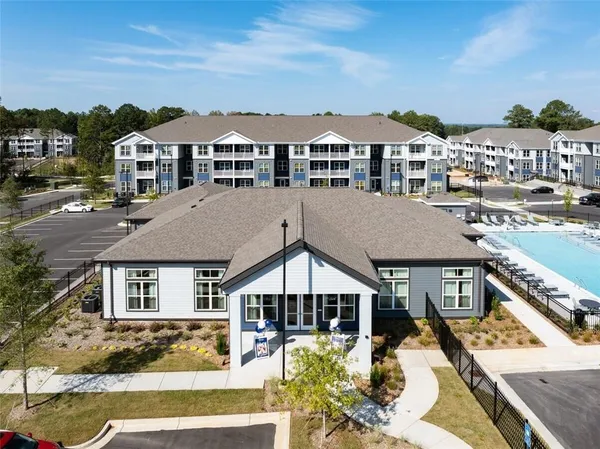 a aerial view of a house with a ocean view