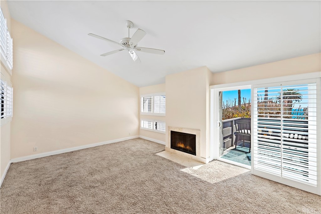 35232 Camino Capistrano, Unit 6 Dana Point, CA 92624 - Photo 13 of 25 a view of a livingroom with a ceiling fan and window