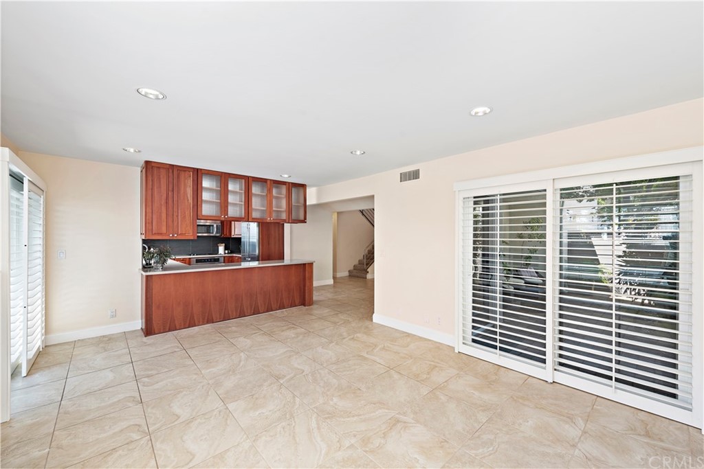 35232 Camino Capistrano, Unit 6 Dana Point, CA 92624 - Photo 25 of 25 a kitchen with stainless steel appliances a refrigerator and a sink