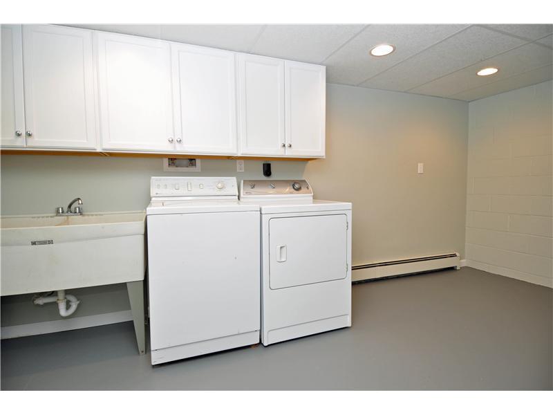 675 Bairdford Road Tarentum, PA 15084 - Photo 11 of 22 Other. Huge, bright laundry room. complete with cabinets, sink and washer and dryer