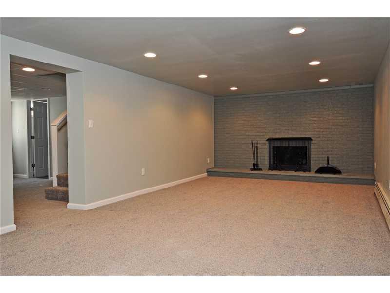 675 Bairdford Road Tarentum, PA 15084 - Photo 6 of 22 Family Room. A second fireplace makes this family room cozy. Please note the recessed lighting